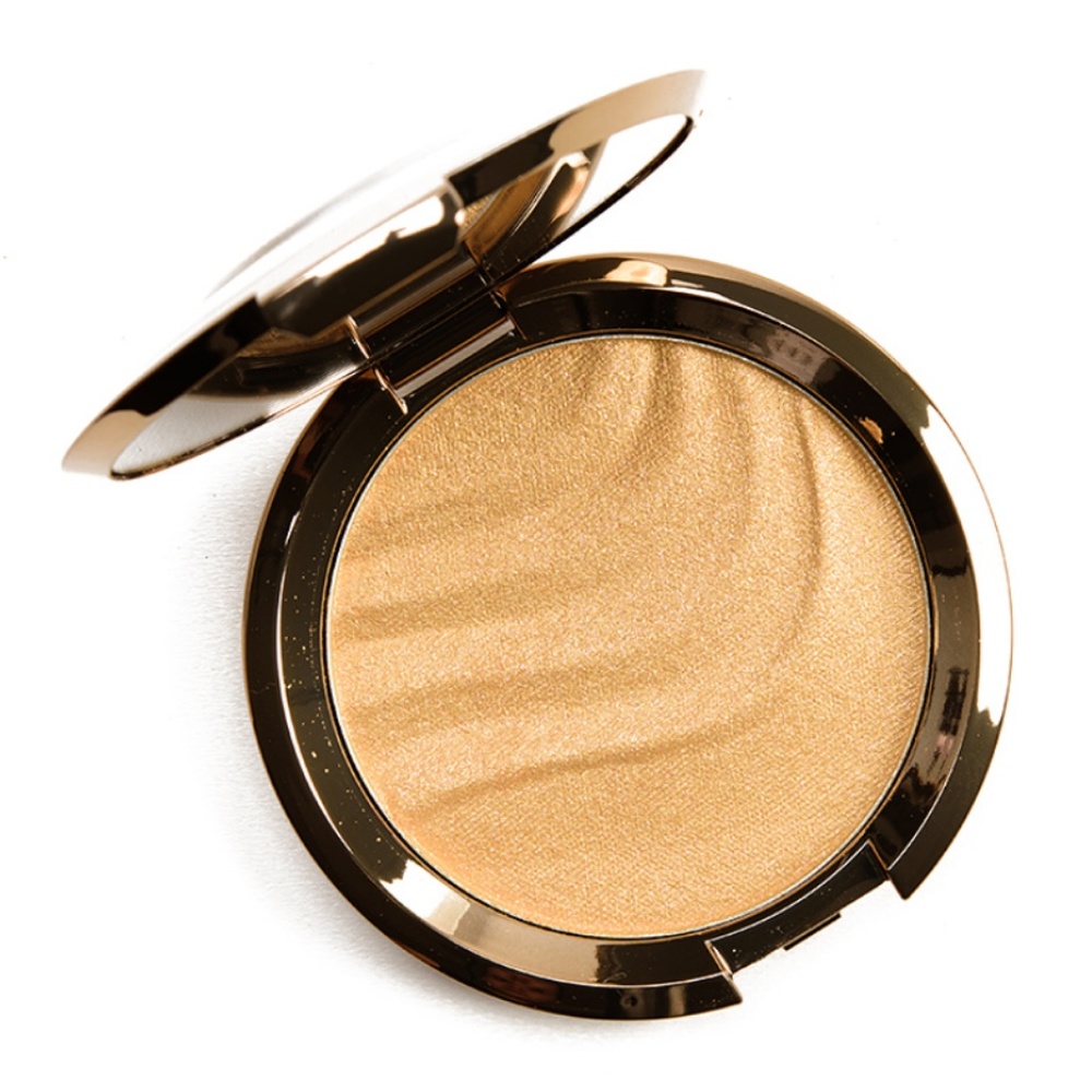 Swatched once Becca highlighter in Gold Lava